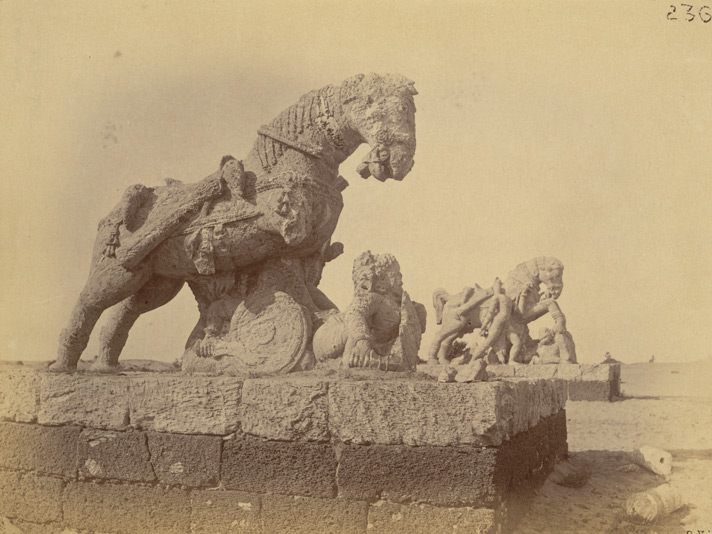 Photograph from 1890 showing two stone horses beside the Konark Sun Temple.