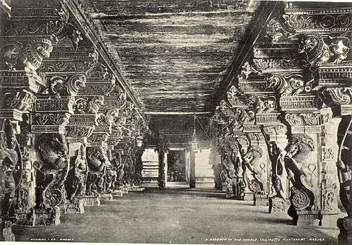 Photograph from the 1890s by Nicholas and Co. showing carved pillars inside the Meenakshi Temple at Madurai.